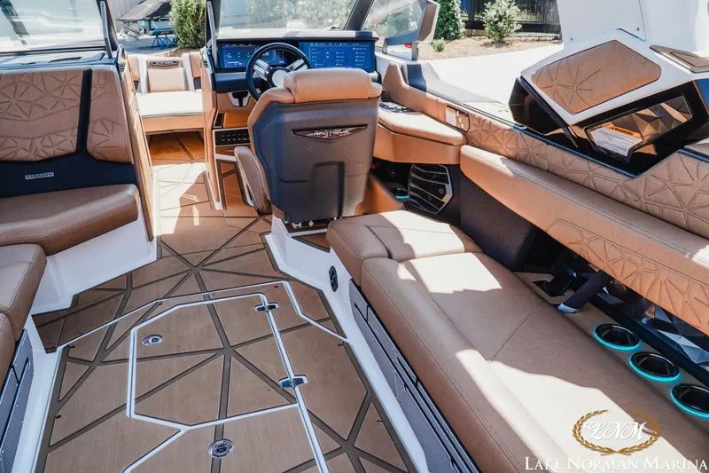 Slide: The Image of Luxurious interior of 2024 Nautique Super Air Nautique G25 Paragon boat with premium seating. - 16