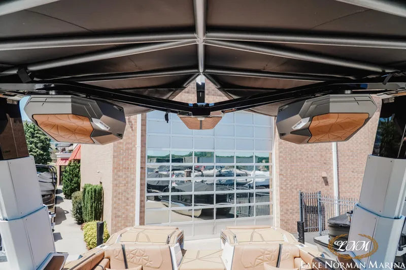 Slide: The Image of 2024 Nautique Super Air Nautique G25 Paragon boat speakers and seating, Lake Norman Marina. - 32