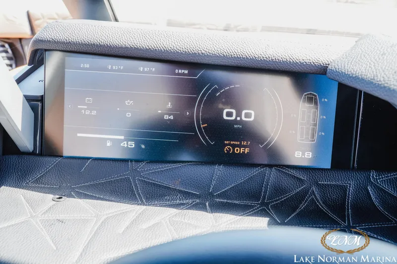 Slide: The Image of 2024 Nautique Super Air Nautique G25 Paragon dashboard display with digital controls and indicators. - 41