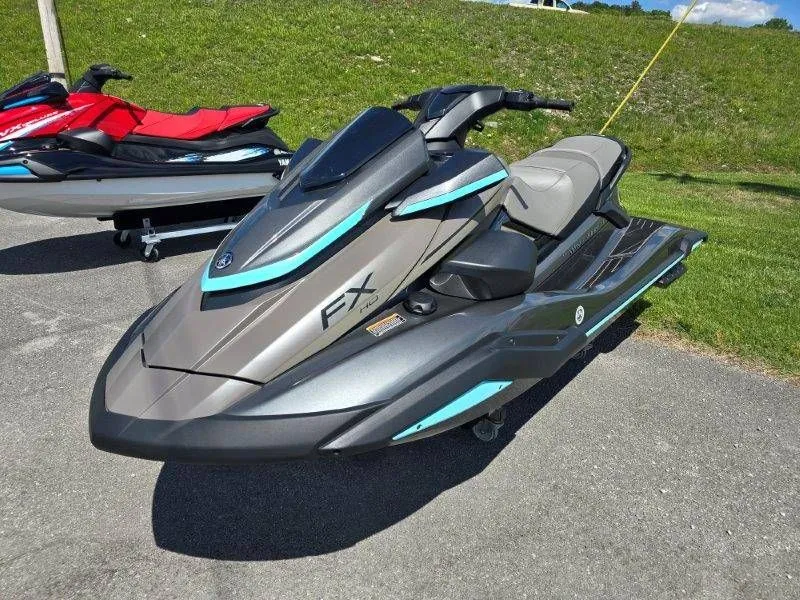 Slide: The Image of 2025 Yamaha Waverunner FX HO with Audio parked on asphalt. - 2
