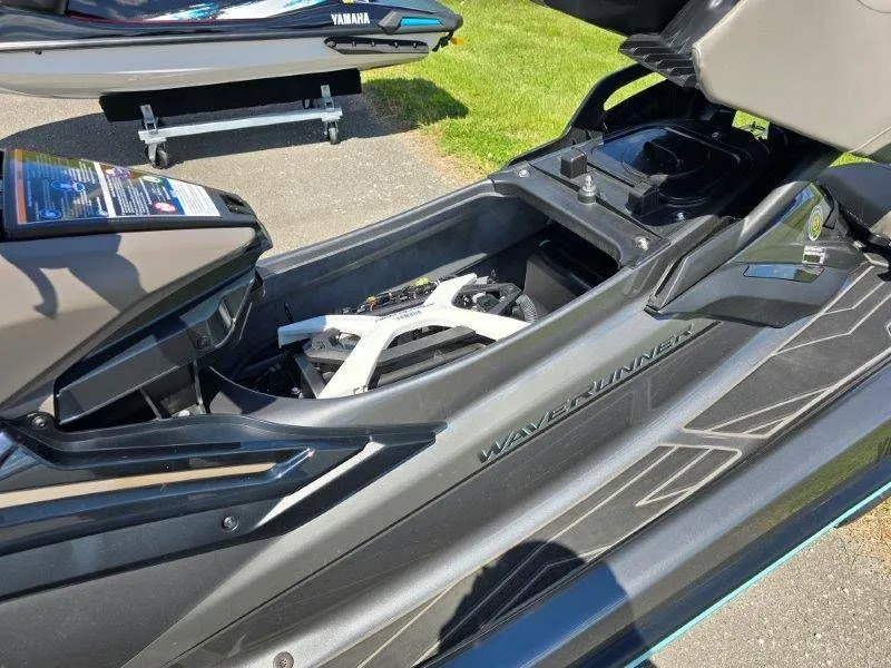 Slide: The Image of 2025 Yamaha Waverunner FX HO with Audio, open storage compartment. - 35
