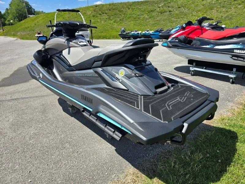 Slide: The Image of 2025 Yamaha Waverunner FX HO with Audio parked on asphalt. - 4