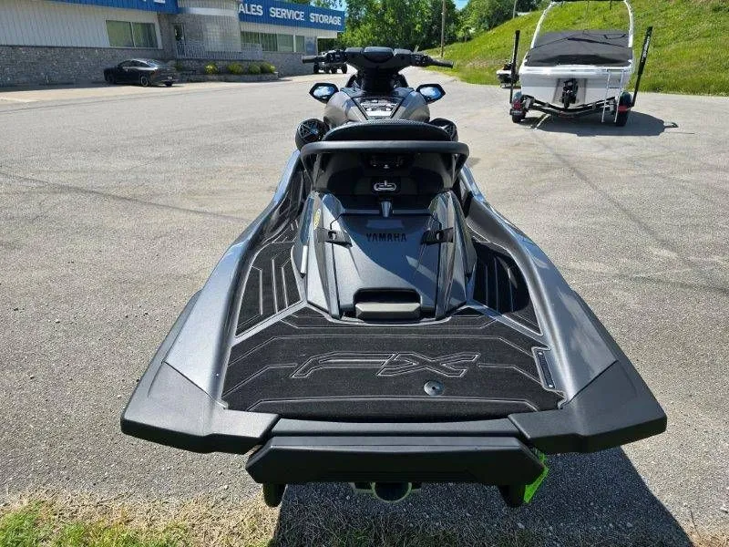 Slide: The Image of 2025 Yamaha Waverunner FX HO with Audio on parking lot. - 9