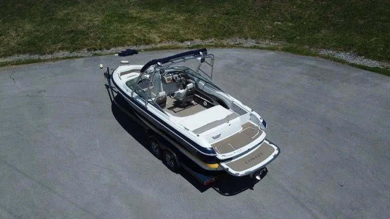 Slide: The Image of Aerial view of a 2006 Cobalt 246 boat on a trailer. - 18