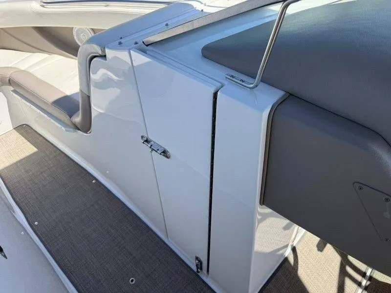Slide: The Image of Interior of a 2006 Cobalt 246 boat with gray upholstery. - 35