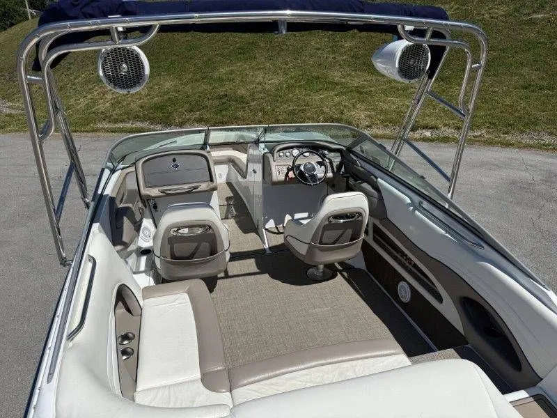 Slide: The Image of Interior of a 2006 Cobalt 246 boat with sleek seating. - 36