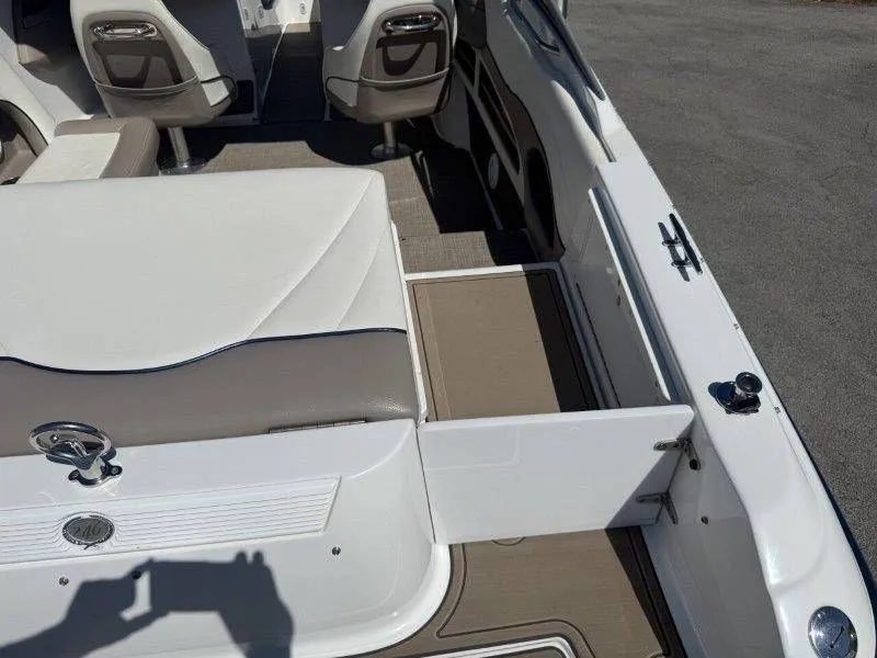 Slide: The Image of Interior of a 2006 Cobalt 246 boat with seating area. - 43