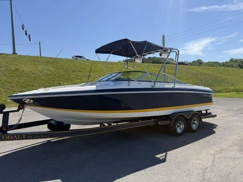Slide: The Image of 2006 Cobalt 246 boat on trailer in sunny weather. - 5