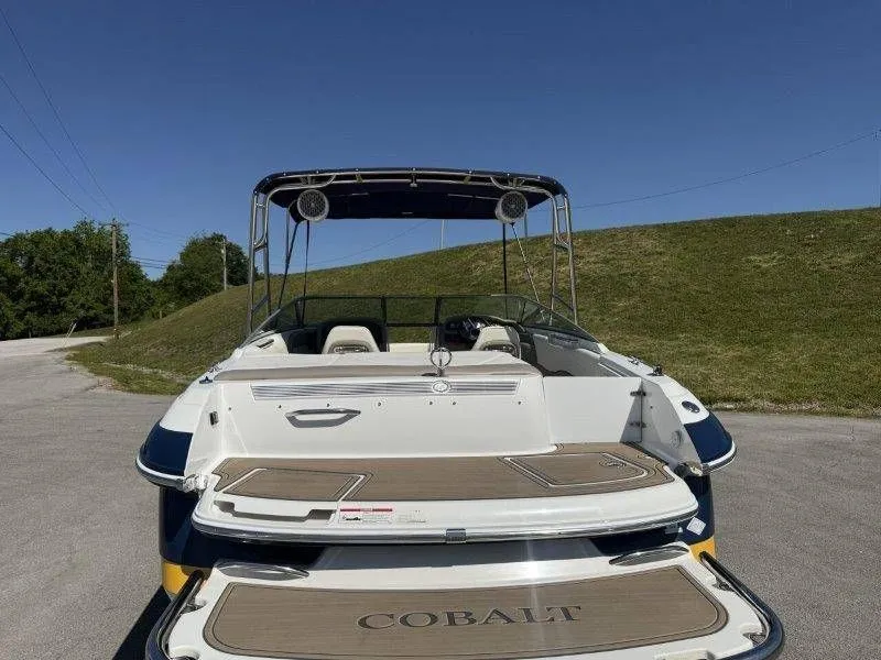Slide: The Image of Rear view of a 2006 Cobalt 246 boat on pavement. - 7