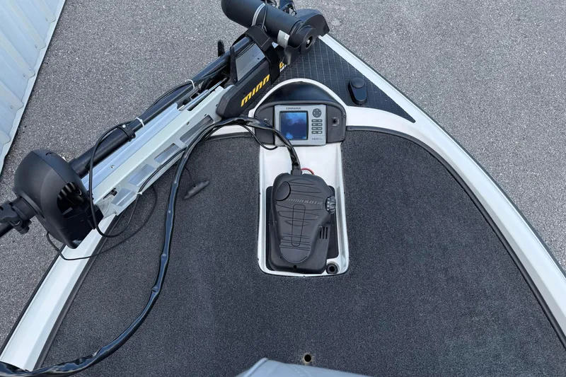 Slide: The Image of 2007 Triton TR-196 boat deck with Minn Kota trolling motor and Lowrance fish finder. - 9
