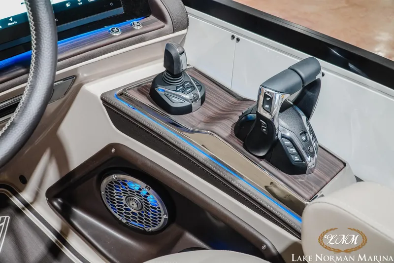 Slide: The Image of 2026 Bennington 27QXSBAT2 boat console with joystick and throttle controls. - 15