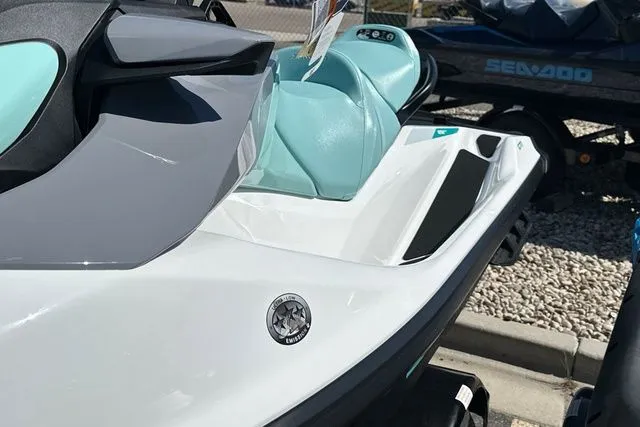 Slide: The Image of 2026 Sea-Doo PWC GTI 130 WH IBR, white and turquoise. - 25