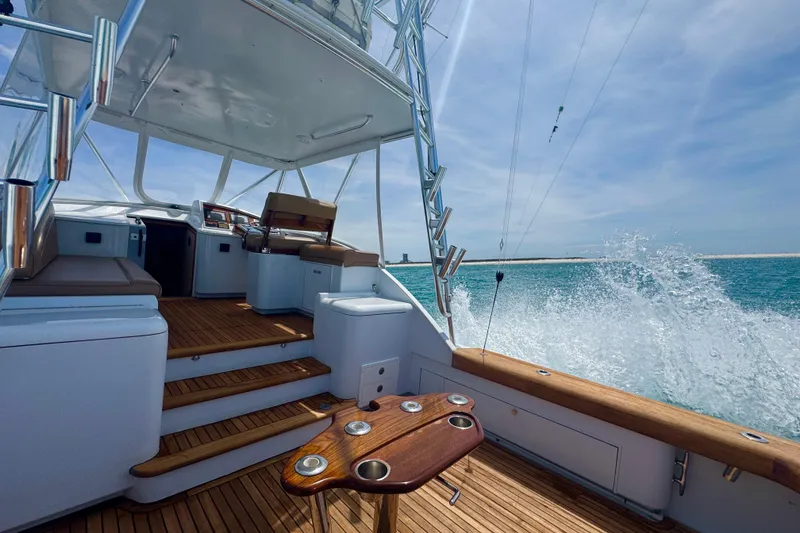 Slide: The Image of Luxury 2006 Miller Marine 36 yacht interior with ocean view and teak deck. - 7