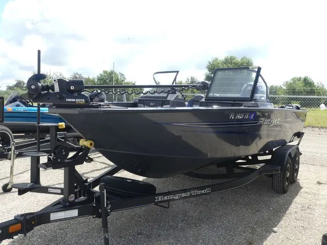 The Image of 2023 Ranger VX 1788 boat parked on trailer outdoors. - 1
