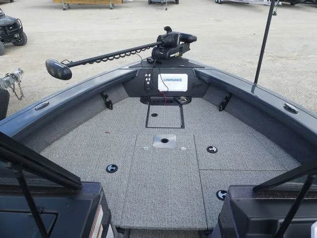 Slide: The Image of Interior view of 2023 Ranger VX 1788 boat with gray carpet flooring. - 11