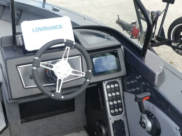 Slide: The Image of Interior view of Ranger VX 1788 boat, 2023 model, featuring steering and electronics. - 14