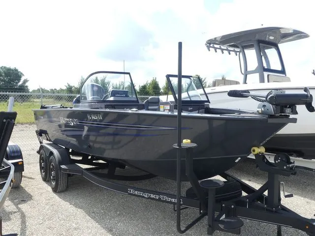Slide: The Image of 2023 Ranger VX 1788 boat parked on trailer outdoors. - 3