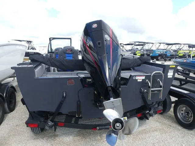 Slide: The Image of 2023 Ranger VX 1788 boat with outboard motor on trailer. - 5
