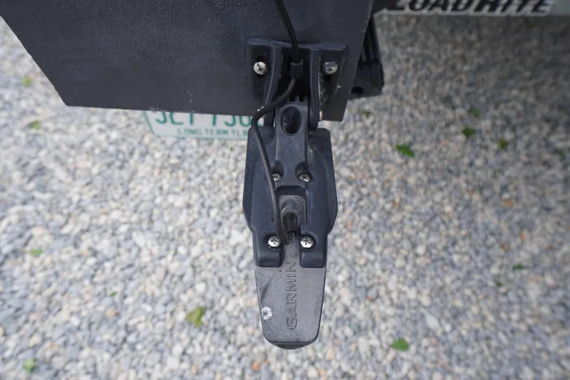 Slide: The Image of Garmin transducer mounted on a 2023 Bennington S 18 Fishing boat. - 12