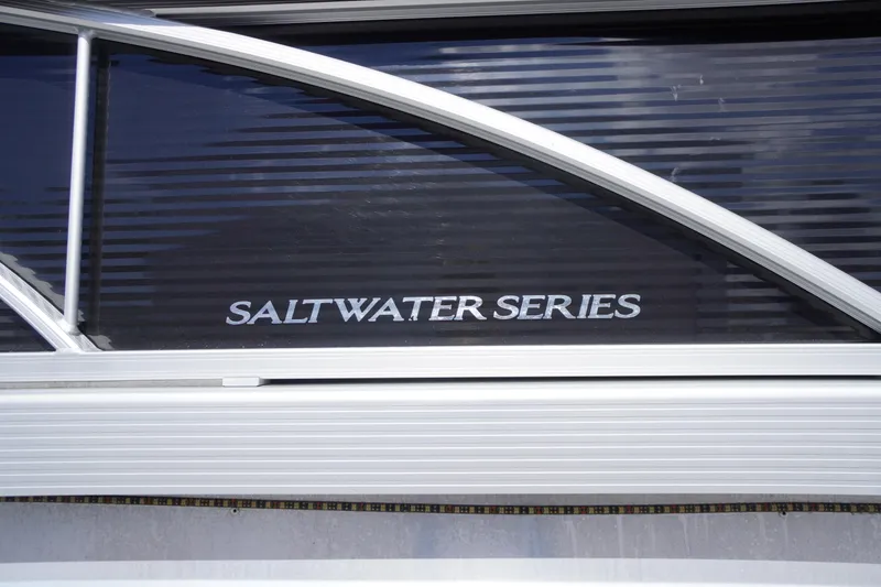 Slide: The Image of 2023 Bennington S 18 Fishing boat, Saltwater Series branding detail. - 13