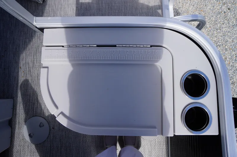 Slide: The Image of 2023 Bennington S 18 Fishing boat console with cup holders and measuring board. - 17