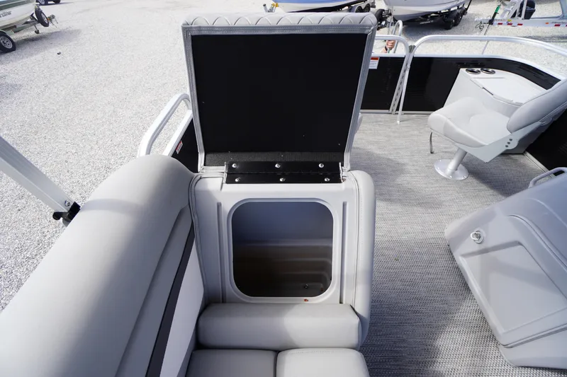 Slide: The Image of 2023 Bennington S 18 Fishing boat interior with open storage compartment. - 25