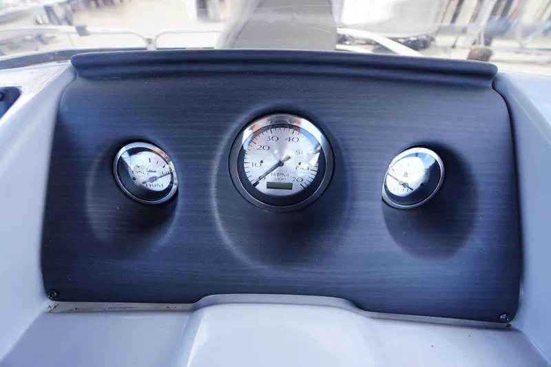 Slide: The Image of Dashboard of 2023 Bennington S 18 Fishing boat with gauges and controls. - 28
