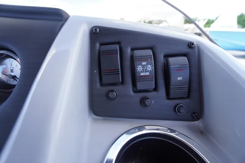 Slide: The Image of Control panel of 2023 Bennington S 18 Fishing boat with switches and fuel gauge. - 29