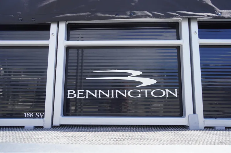 Slide: The Image of 2023 Bennington S 18 Fishing boat logo on sleek black panel. - 3
