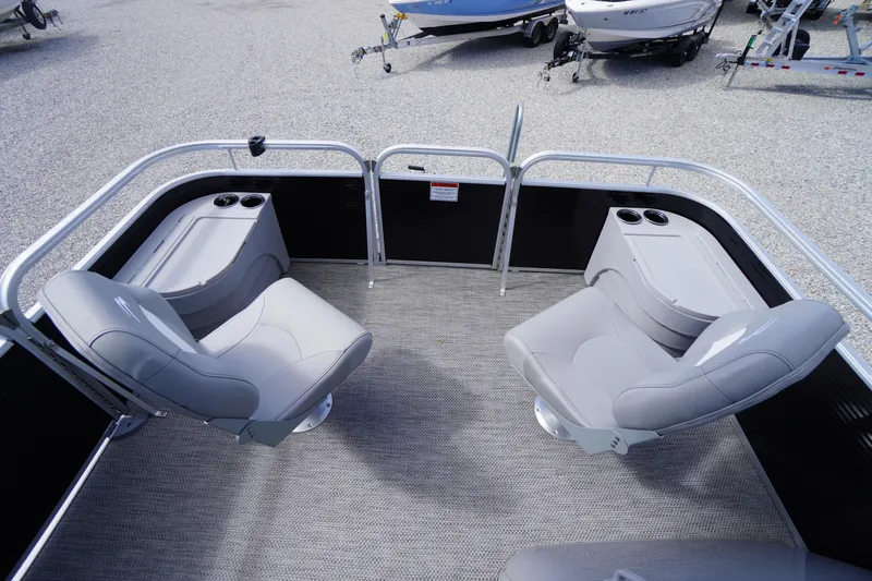 Slide: The Image of 2023 Bennington S 18 Fishing boat interior with swivel seats and cup holders. - 35