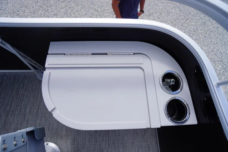Slide: The Image of 2023 Bennington S 18 Fishing boat with a built-in measuring board and cup holders. - 37