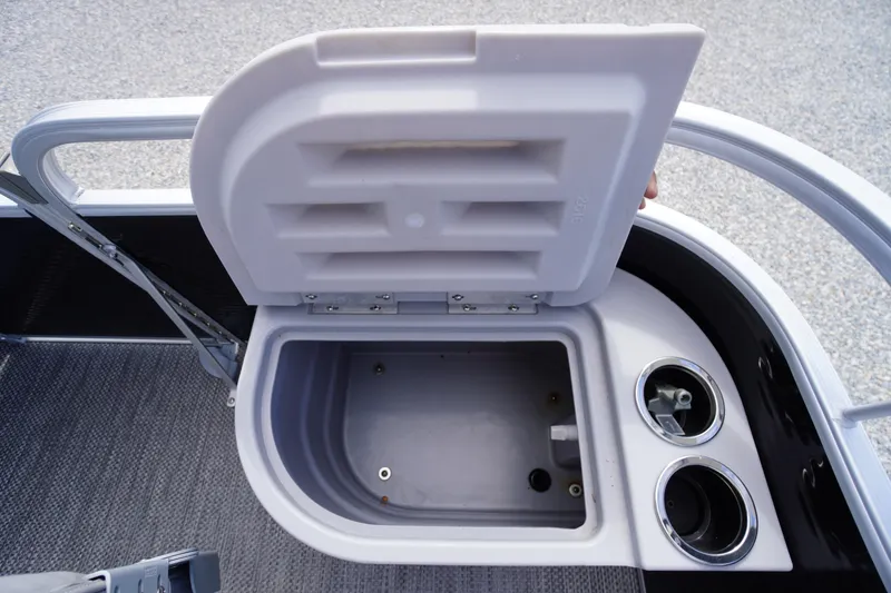Slide: The Image of Open storage compartment on 2023 Bennington S 18 Fishing boat with cup holders. - 38
