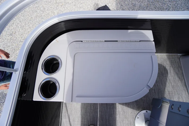 Slide: The Image of 2023 Bennington S 18 Fishing boat console with cup holders and measuring board. - 39
