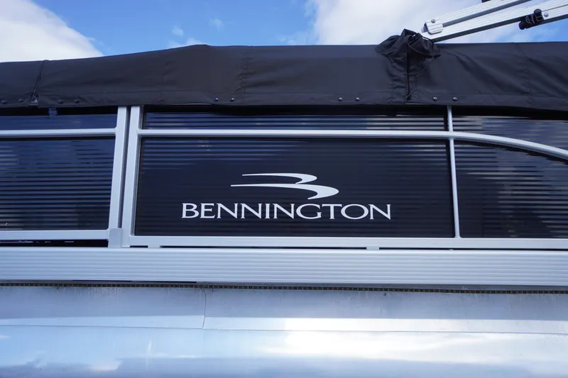 Slide: The Image of 2023 Bennington S 18 Fishing boat with logo and sleek design. - 4