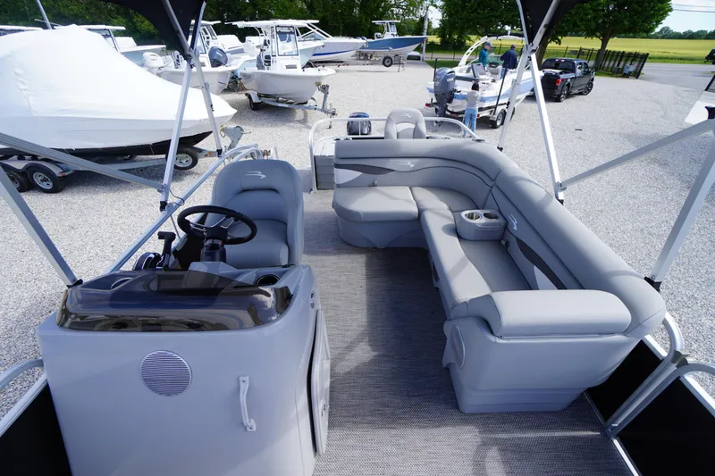 Slide: The Image of 2023 Bennington S 18 Fishing boat interior with seating and steering console. - 41