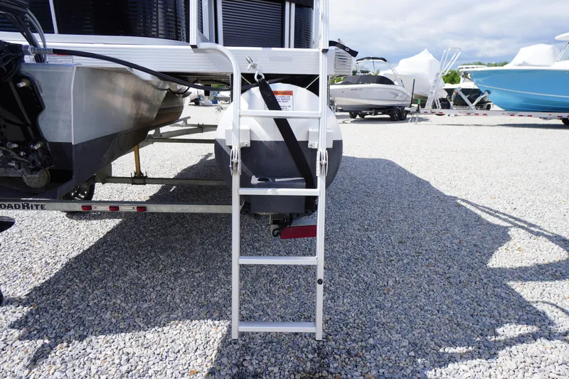 Slide: The Image of 2023 Bennington S 18 Fishing boat ladder on gravel lot. - 9