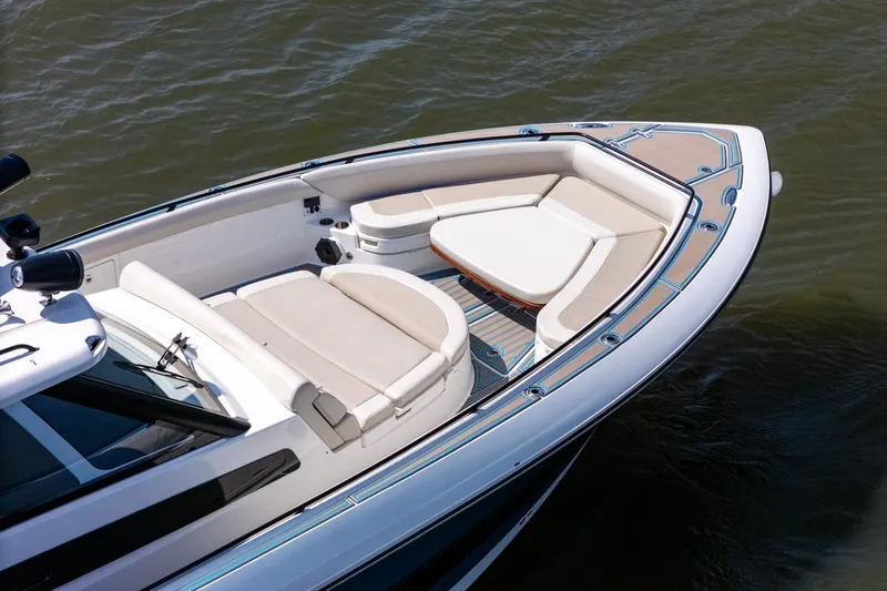 Slide: The Image of 2021 Boston Whaler 420 Outrage boat with luxurious seating on calm water. - 5