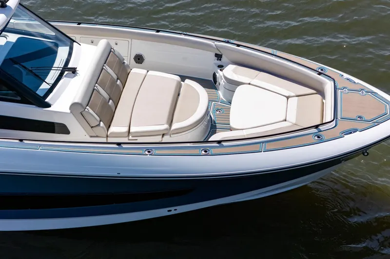 Slide: The Image of 2021 Boston Whaler 420 Outrage boat with luxurious seating and sleek design on water. - 7