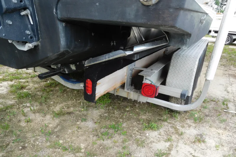 Slide: The Image of 2003 Hydra-Sports Vector 2800 CC boat on trailer, rear view with visible taillights. - 3