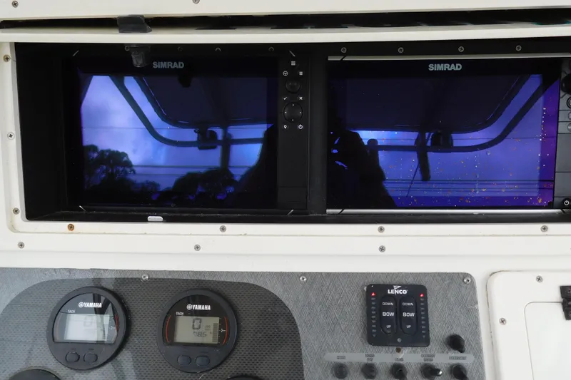 Slide: The Image of Dashboard of a 2003 Hydra-Sports Vector 2800 CC with Simrad displays and Yamaha gauges. - 5
