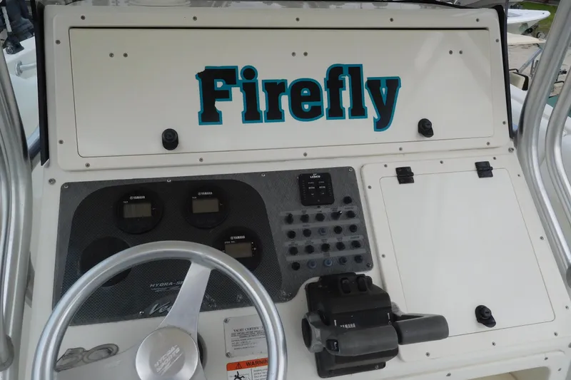 Slide: The Image of 2003 Hydra-Sports Vector 2800 CC dashboard with "Firefly" label and Yamaha controls. - 8