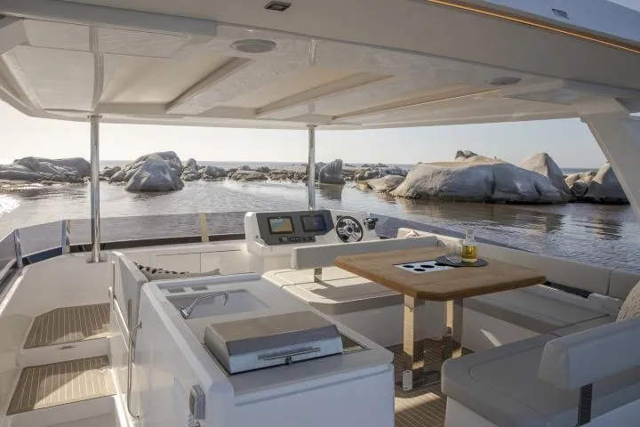 Slide: The Image of Manufacturer Provided Image: Luxurious 2025 Leopard 40 Powercat yacht interior with scenic ocean view. - 10