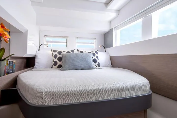 Slide: The Image of Manufacturer Provided Image: Luxurious bedroom interior of 2025 Leopard 40 Powercat with modern decor and ample natural light. - 11