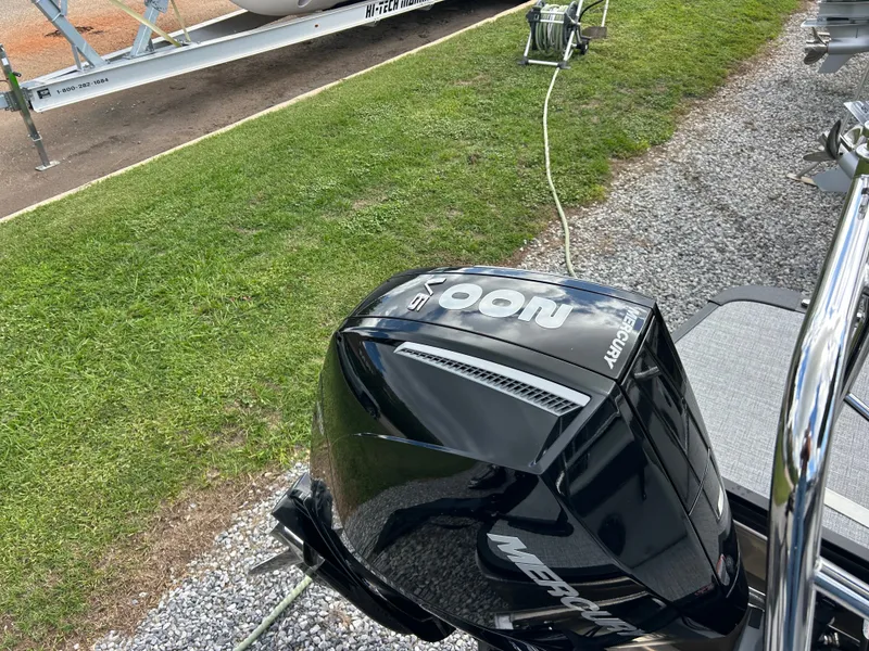 Slide: The Image of A Mercury outboard motor is attached to a boat on a trailer. - 6