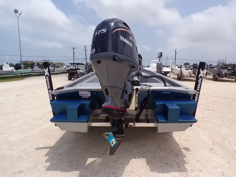 Slide: The Image of Rear view of 2026 Xpress SW22B boat with Yamaha engine. - 11
