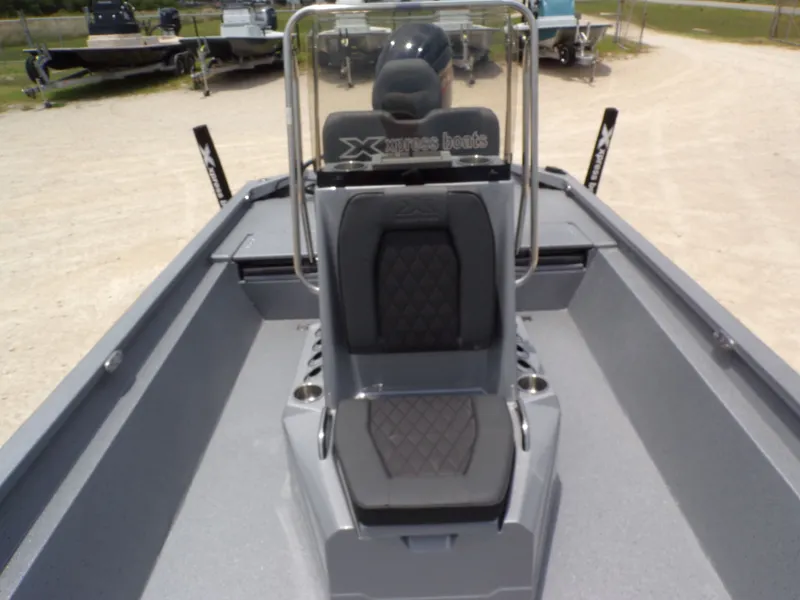 Slide: The Image of 2026 Xpress SW22B boat featuring modern seating design. - 17