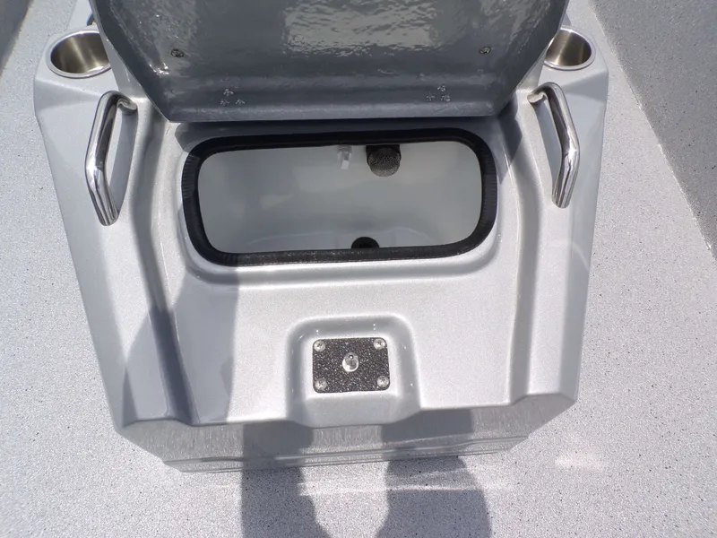 Slide: The Image of Open storage compartment on Xpress SW22B boat, year 2026. - 18