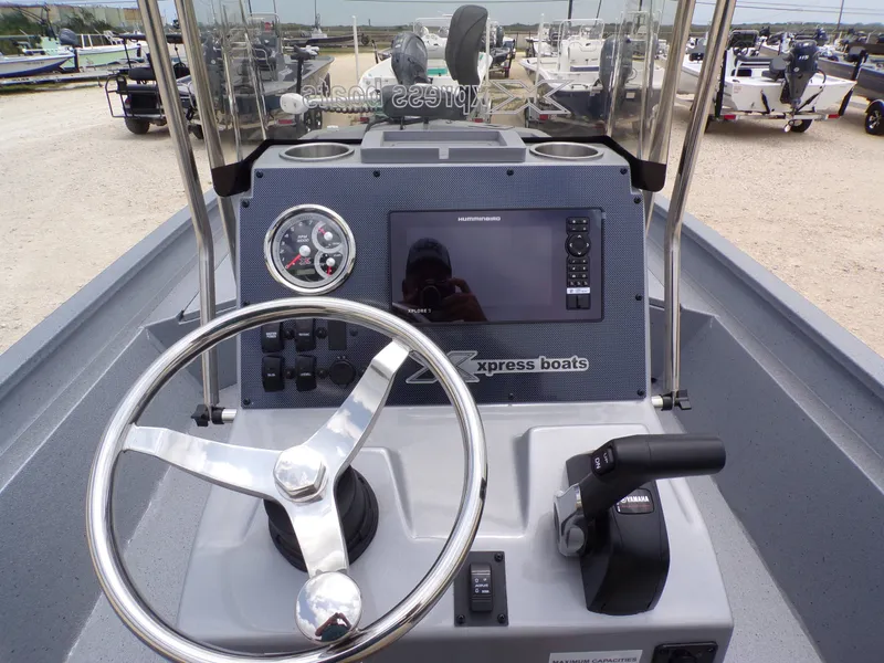 Slide: The Image of Xpress SW22B boat steering console, model year 2026. - 22