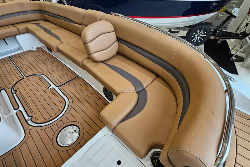 Slide: The Image of Luxurious seating on 2022 Starcraft Star Step 221 E I/O boat with teak flooring. - 15