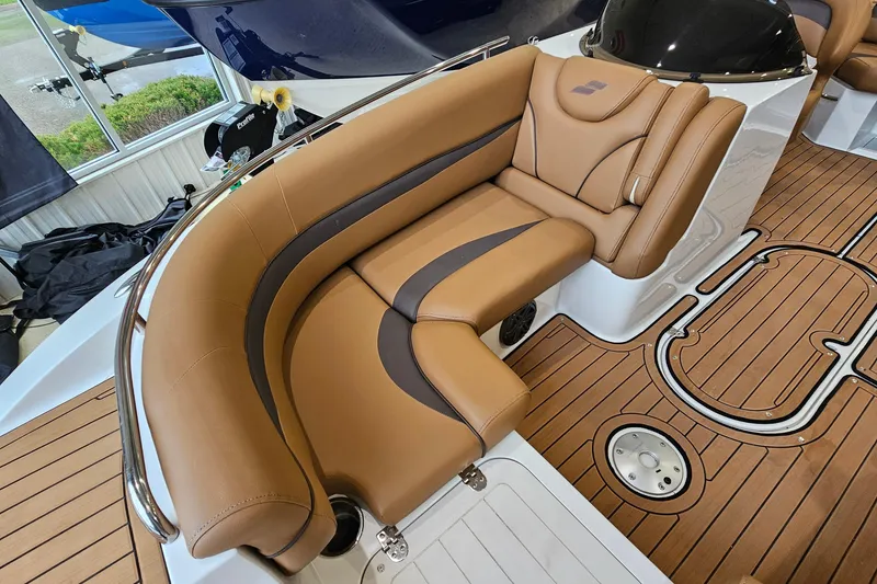 Slide: The Image of Luxurious seating on 2022 Starcraft Star Step 221 E I/O boat with teak flooring. - 16